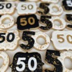 50th birthday cookies in black white and gold.jpg
